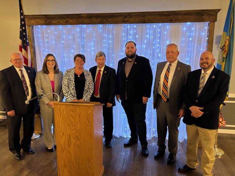 Officials assembled to recognize the 2024 DLLG Clerk of the Year are (l-r) DLLG vice president and Georgetown Mayor Bill West; Rep. Sarah McBride; 2024 Clerk of the Year Kimberly Layton, Delmar (DE) town clerk; Delmar (DE) Mayor Tom Bauer; Delmar (MD) Mayor Benjamin Sorden; Delmar (DE) City Manager Jeff Fleetwood; and DLLG president and Clayton Mayor Nick Smith.